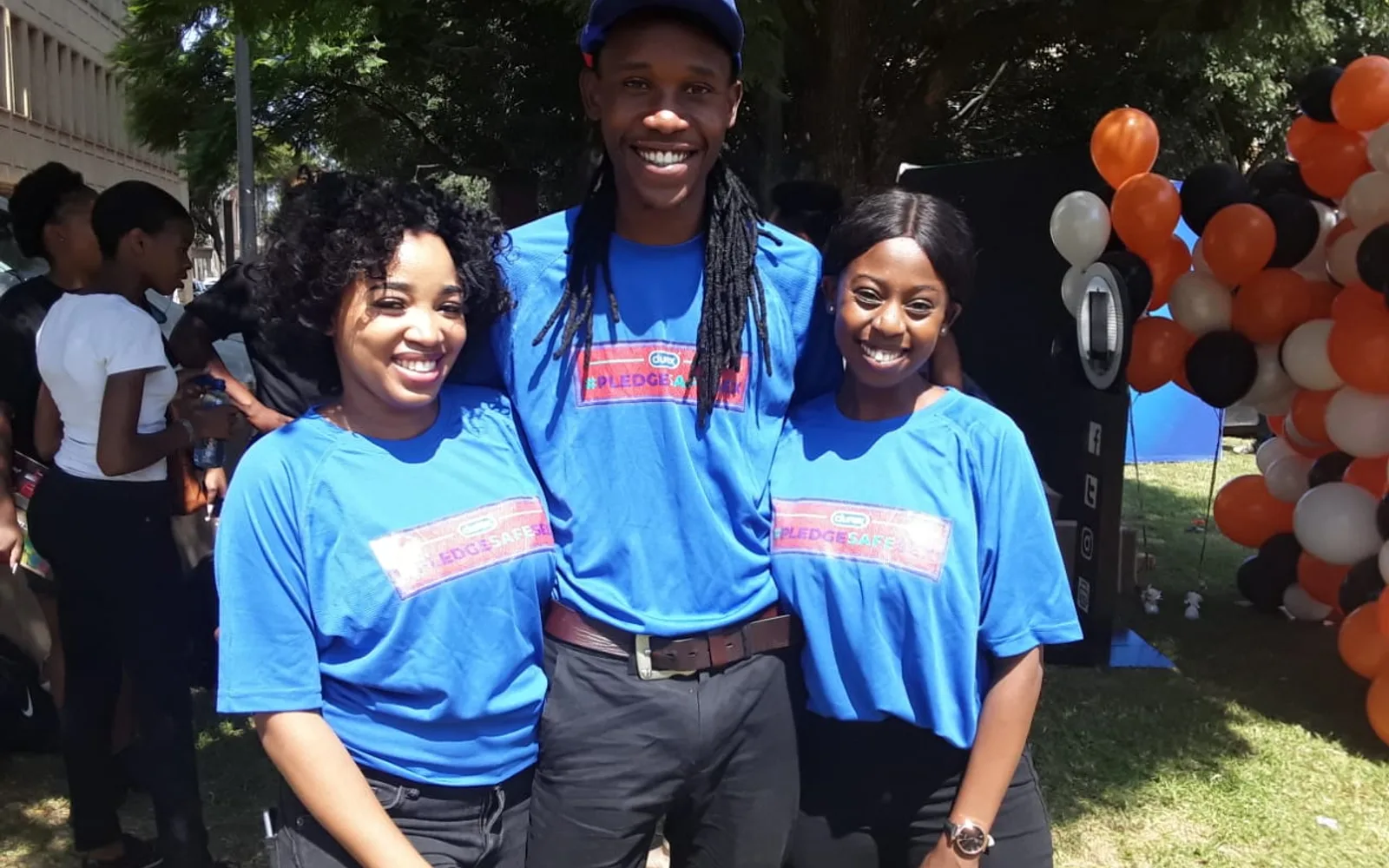 Brand ambassadors in matching kit at an outdoor activation
